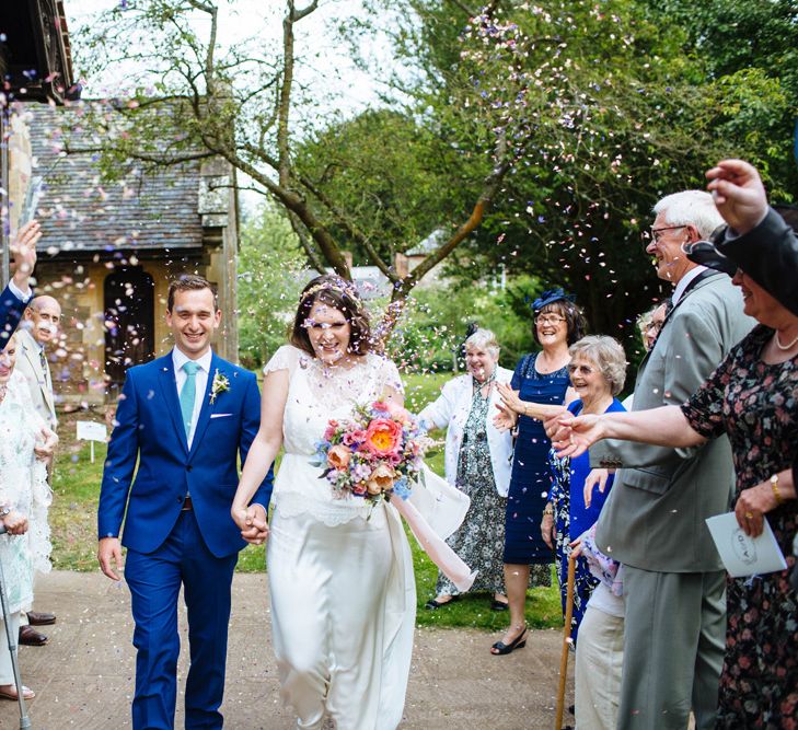 Confetti Moment | Church Wedding Ceremony | Bride in Belle and Bunny Bridal Separates | Groom in John Lewis Kin Navy Blue Suit | Laura Debourde Photography