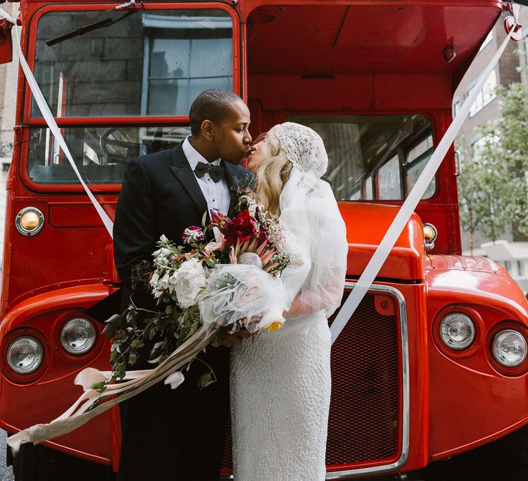 Bride in Eliza Jane Howell Clarissa Wedding Dress & Groom in Tuxedo