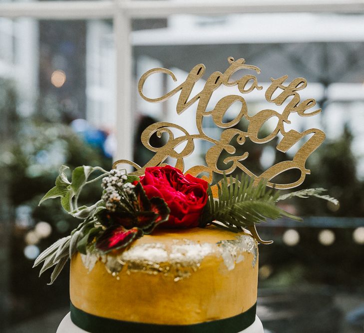 Laser cut 'to the moon and back' cake topper