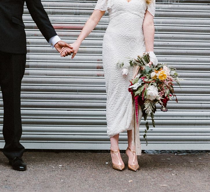 Bride in Eliza Jane Howell Clarissa Wedding Dress & Groom in Tuxedo