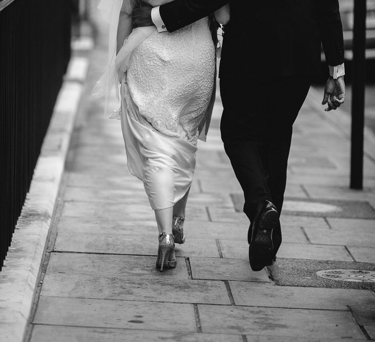 Bride in Eliza Jane Howell Clarissa Wedding Dress & Groom in Tuxedo