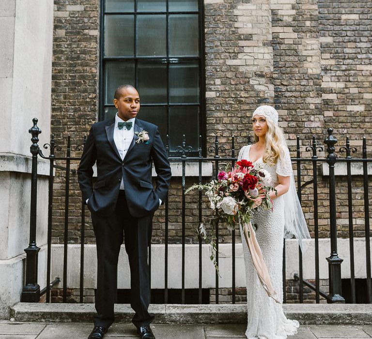 Bride in Eliza Jane Howell Clarissa Wedding Dress & Groom in Tuxedo