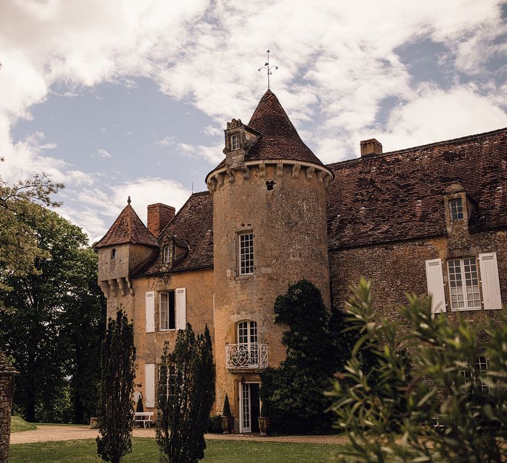 Elegant Pronovias Bride For A Destination Wedding At Chateau de Cazenac With Rustic Rose Floral Arrangements And Images From Samuel Docker