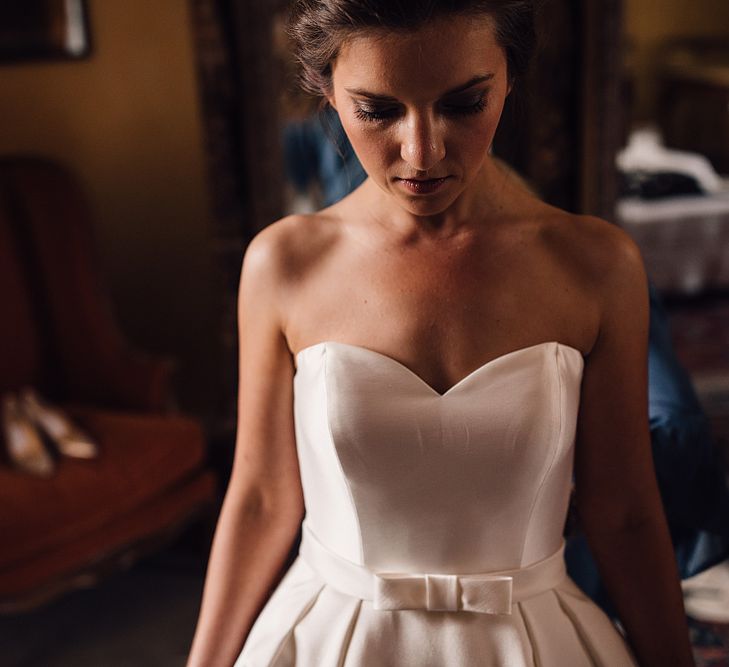 Elegant Pronovias Bride For A Destination Wedding At Chateau de Cazenac With Rustic Rose Floral Arrangements And Images From Samuel Docker