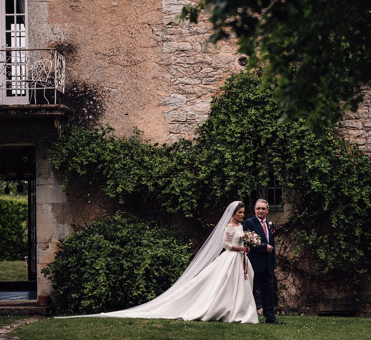 Elegant Pronovias Bride For A Destination Wedding At Chateau de Cazenac With Rustic Rose Floral Arrangements And Images From Samuel Docker