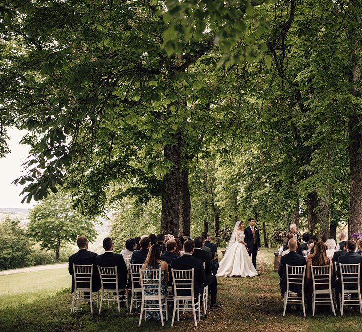 Elegant Pronovias Bride For A Destination Wedding At Chateau de Cazenac With Rustic Rose Floral Arrangements And Images From Samuel Docker