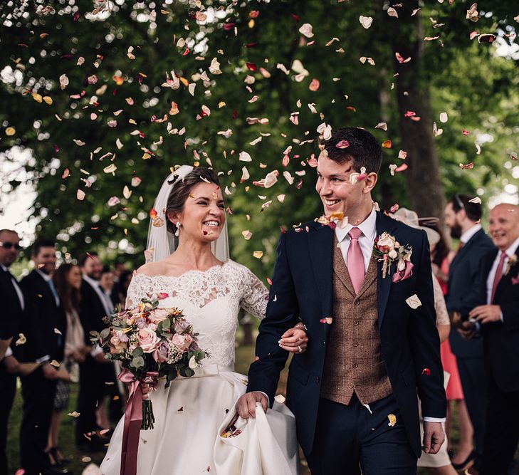 Elegant Pronovias Bride For A Destination Wedding At Chateau de Cazenac With Rustic Rose Floral Arrangements And Images From Samuel Docker