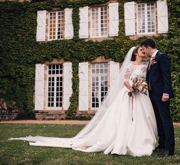 Elegant Pronovias Bride For A Destination Wedding At Chateau de Cazenac With Rustic Rose Floral Arrangements And Images From Samuel Docker