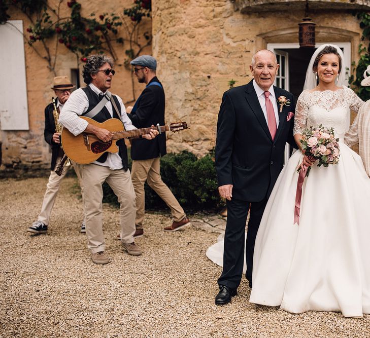 Elegant Pronovias Bride For A Destination Wedding At Chateau de Cazenac With Rustic Rose Floral Arrangements And Images From Samuel Docker