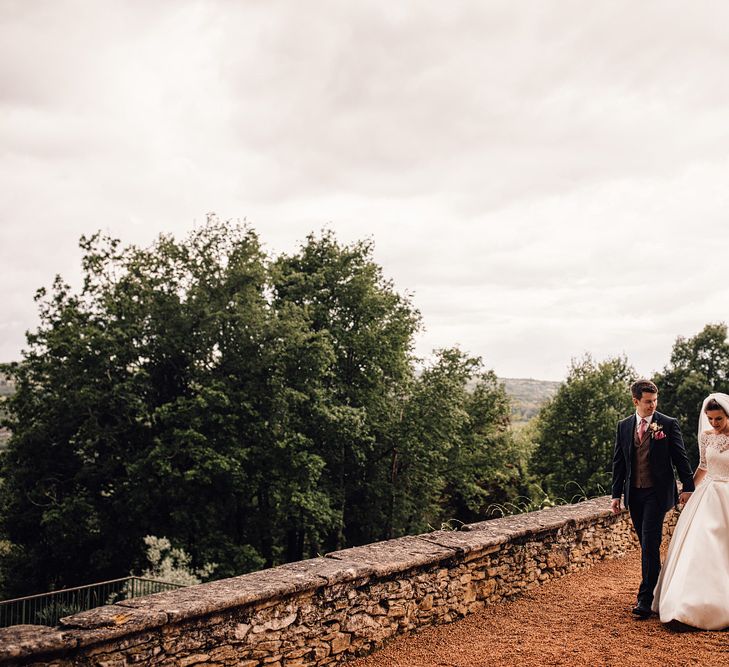 Elegant Pronovias Bride For A Destination Wedding At Chateau de Cazenac With Rustic Rose Floral Arrangements And Images From Samuel Docker