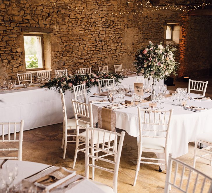 Elegant Pronovias Bride For A Destination Wedding At Chateau de Cazenac With Rustic Rose Floral Arrangements And Images From Samuel Docker