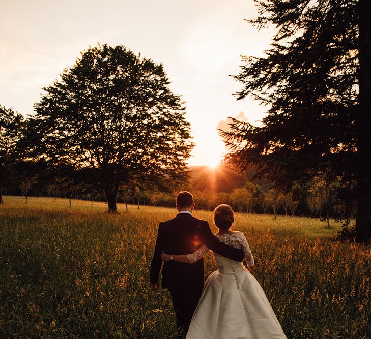 Elegant Pronovias Bride For A Destination Wedding At Chateau de Cazenac With Rustic Rose Floral Arrangements And Images From Samuel Docker