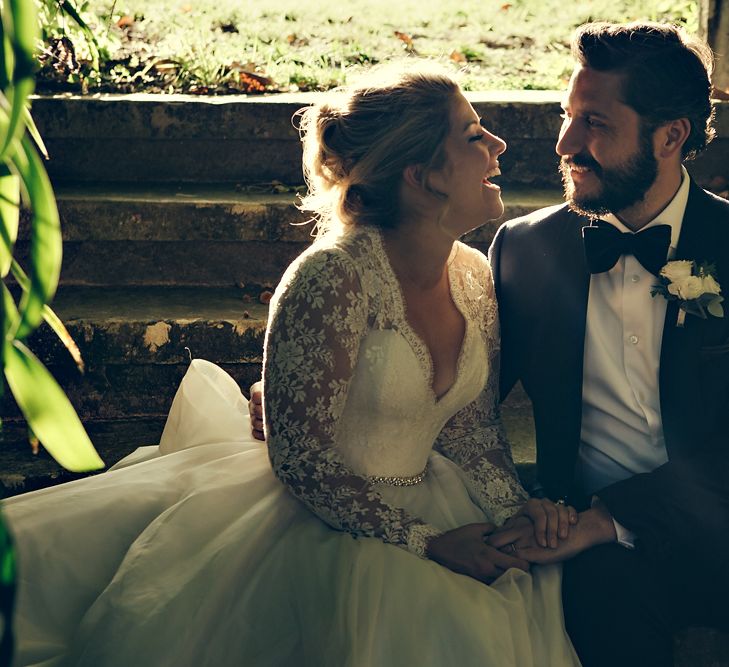 Bride in Bespoke Lyn Ashworth by Sarah Barrett Wedding Dress & Groom in Charles Tyrwhitt Black Tie Suit