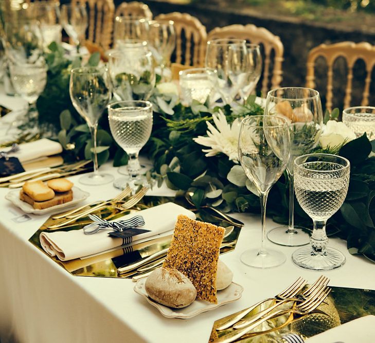 Elegant Table Scape with Greenery Table Runner & Gold Candelabras