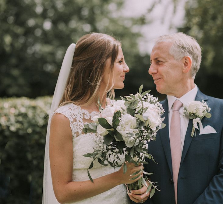 Stunning Ronald Joyce Bride For A Family Wedding At Leez Priory With Large Wedding Party & Bridesmaids In Pink With Images From Nataly J Photography