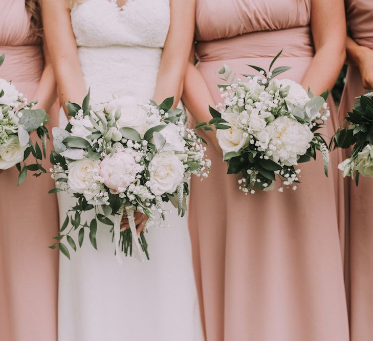 Stunning Ronald Joyce Bride For A Family Wedding At Leez Priory With Large Wedding Party & Bridesmaids In Pink With Images From Nataly J Photography