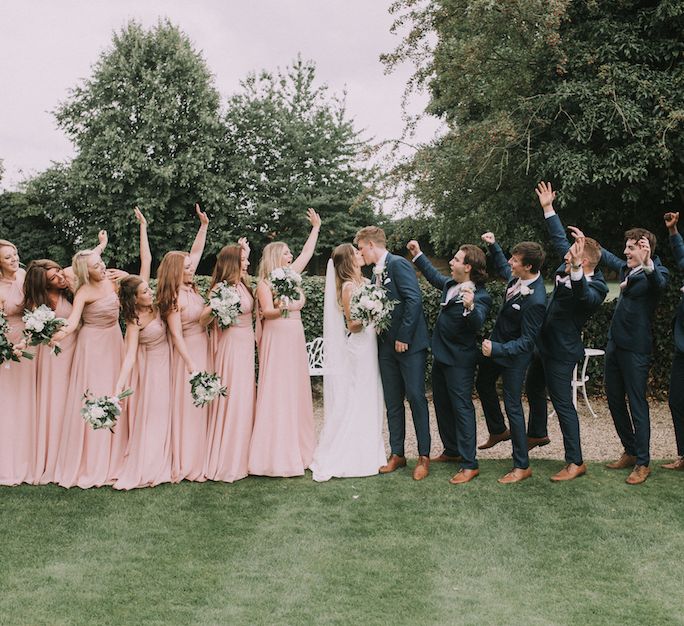 Stunning Ronald Joyce Bride For A Family Wedding At Leez Priory With Large Wedding Party & Bridesmaids In Pink With Images From Nataly J Photography