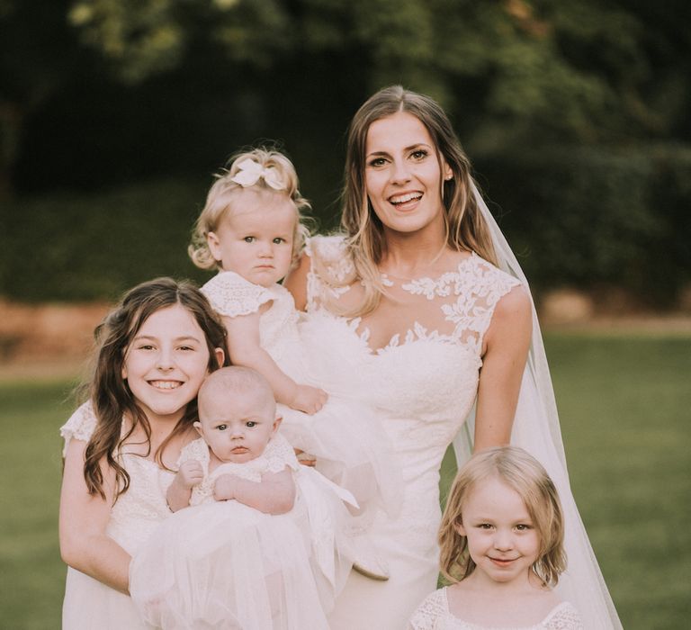 Stunning Ronald Joyce Bride For A Family Wedding At Leez Priory With Large Wedding Party & Bridesmaids In Pink With Images From Nataly J Photography