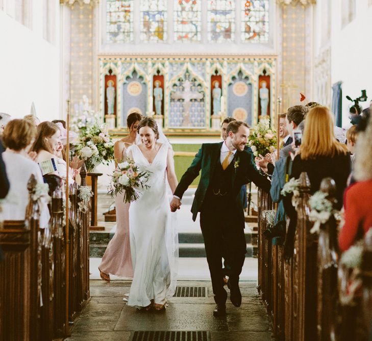 Bride in Rose & Delilah Gown | Groom in Donegal Green Wool Three Piece Suit from Beggars Run | David Jenkins Photography | Confetti & Silk Films