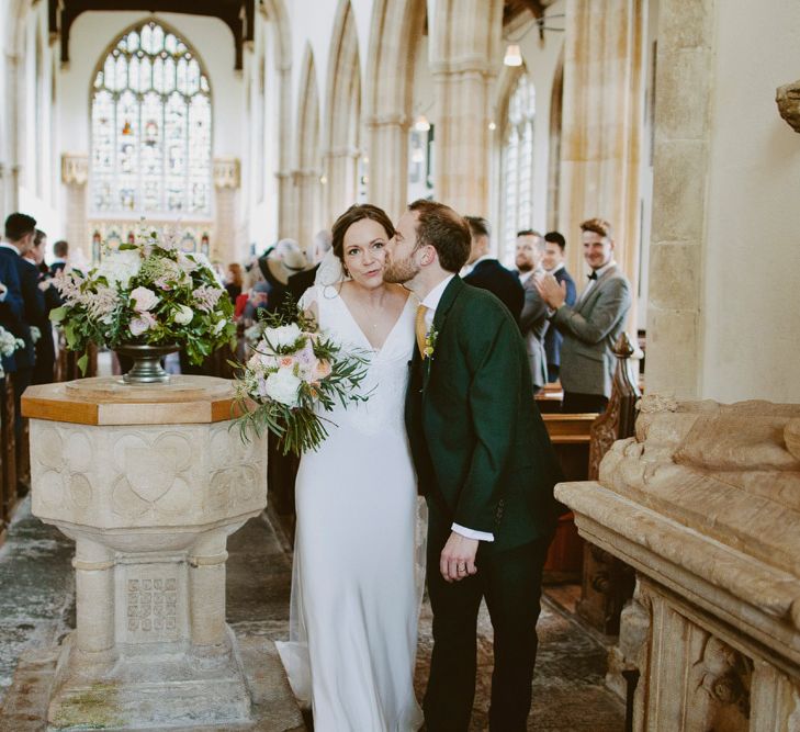 Bride in Rose & Delilah Gown | Groom in Donegal Green Wool Three Piece Suit from Beggars Run | David Jenkins Photography | Confetti & Silk Films