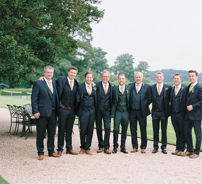 Groomsmen in Donegal Green Wool Three Piece Suits from Beggars Run | David Jenkins Photography | Confetti & Silk Films