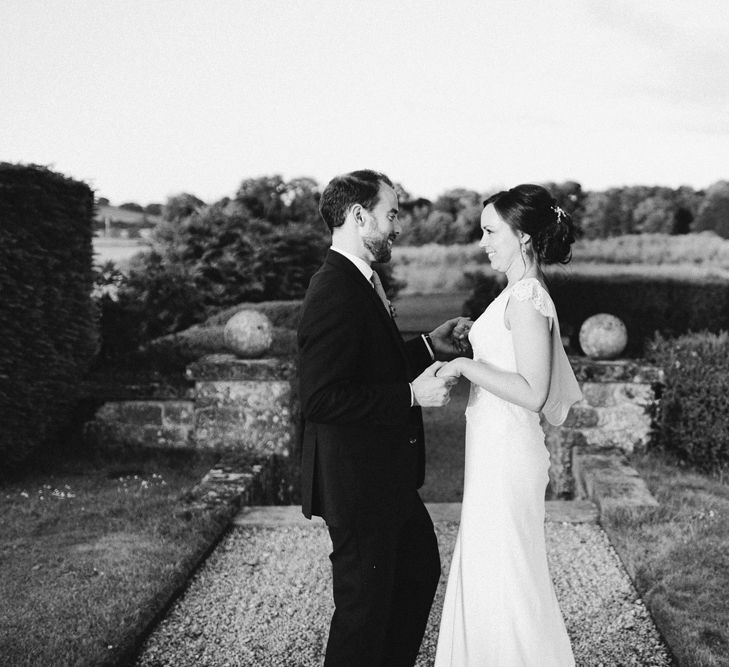 Bride in Rose & Delilah Gown | Groom in Donegal Green Wool Three Piece Suit from Beggars Run | David Jenkins Photography | Confetti & Silk Films