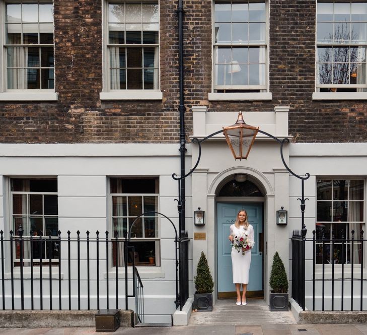 Bride in Pleats Please Issey Miyak Dress | Chic London Wedding at St Bartholomew the Great Church & St John Bar & Restaurant | Helen Abraham Photography