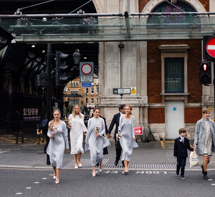 Bride & Bridesmaids in Pleats Please Issey Miyak Dresses | Chic London Wedding at St Bartholomew the Great Church & St John Bar & Restaurant | Helen Abraham Photography