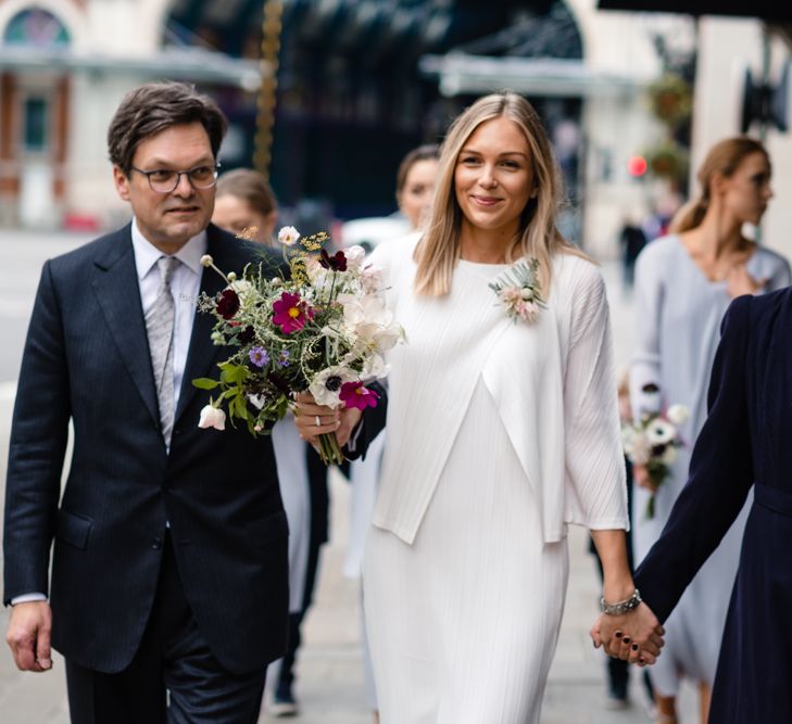 Pleats Please Issey Miyak Dress | Chic London Wedding at St Bartholomew the Great Church & St John Bar & Restaurant | Helen Abraham Photography