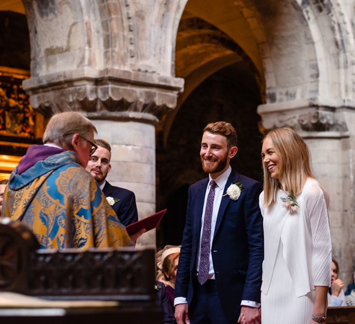 Wedding Ceremony | Bride in Pleats Please Issey Miyak Dress | Groom in Beggars Run Suit | Chic London Wedding at St Bartholomew the Great Church & St John Bar & Restaurant | Helen Abraham Photography