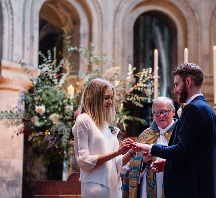 Wedding Ceremony | Bride in Pleats Please Issey Miyak Dress | Groom in Beggars Run Suit | Chic London Wedding at St Bartholomew the Great Church & St John Bar & Restaurant | Helen Abraham Photography