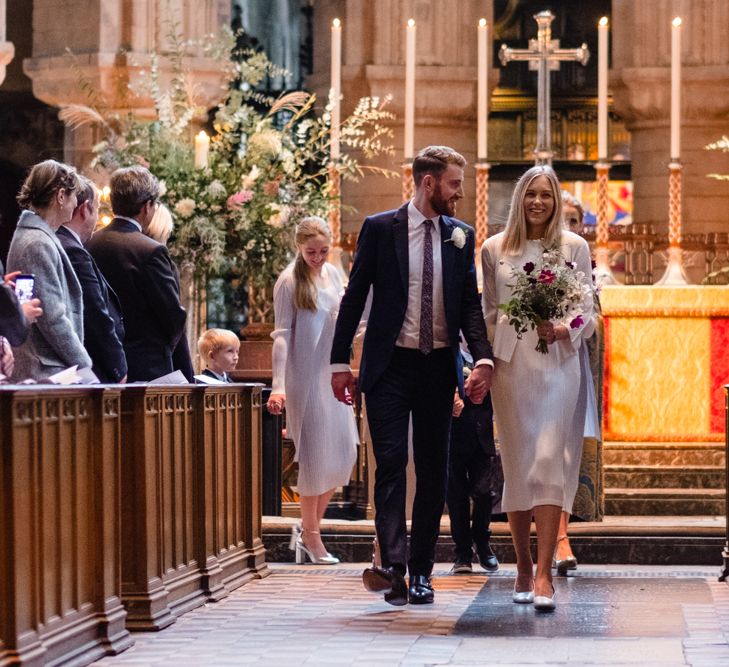 Wedding Ceremony | Bride in Pleats Please Issey Miyak Dress | Groom in Beggars Run Suit | Chic London Wedding at St Bartholomew the Great Church & St John Bar & Restaurant | Helen Abraham Photography