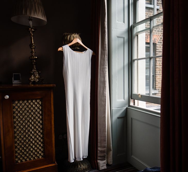 Pleats Please Issey Miyak Dress | Chic London Wedding at St Bartholomew the Great Church & St John Bar & Restaurant | Helen Abraham Photography