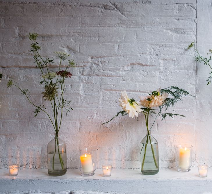 Flower Stems in Bottles Wedding Decor | Chic London Wedding at St Bartholomew the Great Church & St John Bar & Restaurant | Helen Abraham Photography