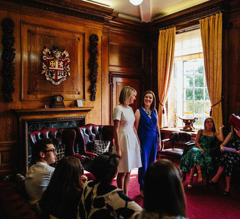 Two Brides in White Hugo Boss Dress & Cobalt Blue Diane Von Furstenberg Jumpsuit