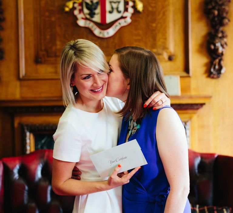 Two Brides in White Hugo Boss Dress & Cobalt Blue Diane Von Furstenberg Jumpsuit