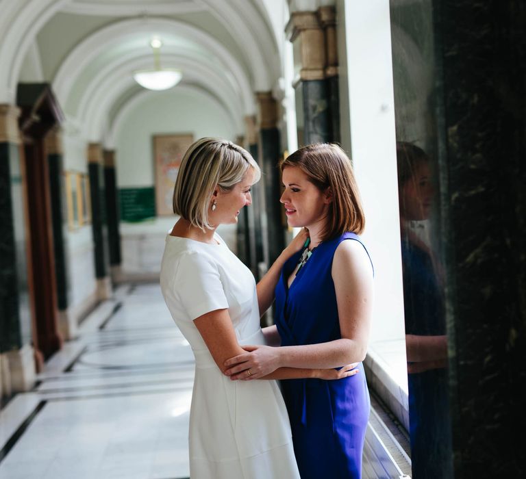 Two Brides in White Hugo Boss Dress & Cobalt Blue Diane Von Furstenberg Jumpsuit