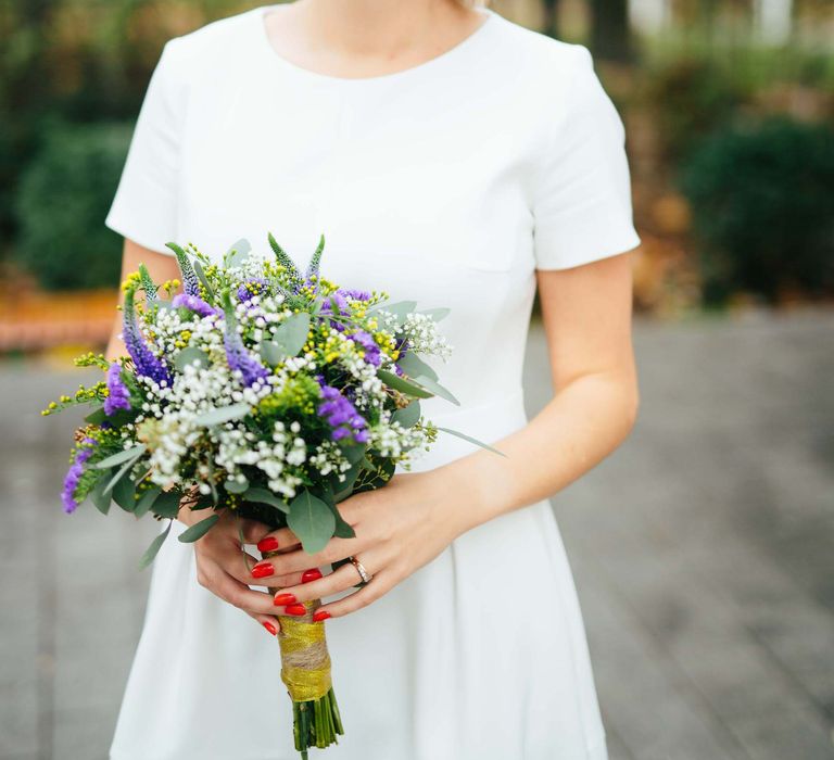 Bride in White Hugo Boss Dress