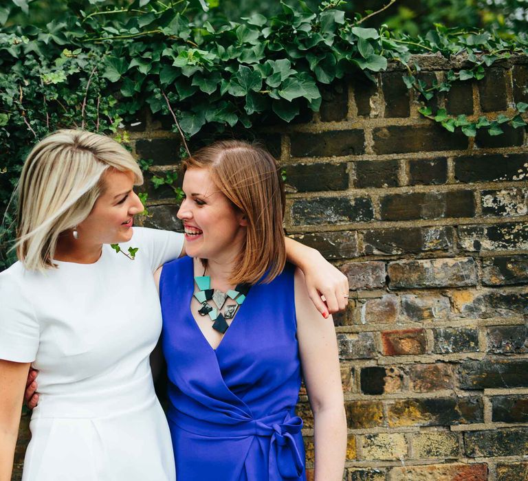 Two Brides in White Hugo Boss Dress & Cobalt Blue Diane Von Furstenberg Jumpsuit