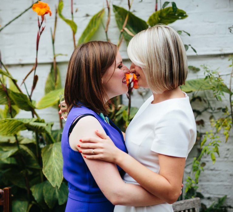 Two Brides in White Hugo Boss Dress & Cobalt Blue Diane Von Furstenberg Jumpsuit