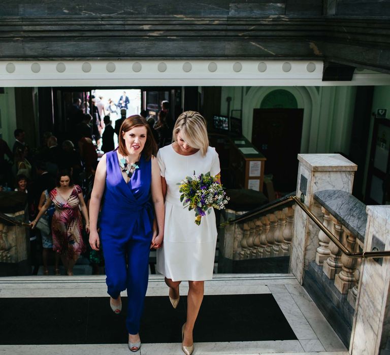 Two Brides in White Hugo Boss Dress & Cobalt Blue Diane Von Furstenberg Jumpsuit