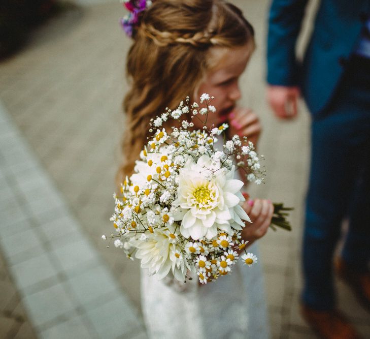 Flower Girl In White Dress With White Posy