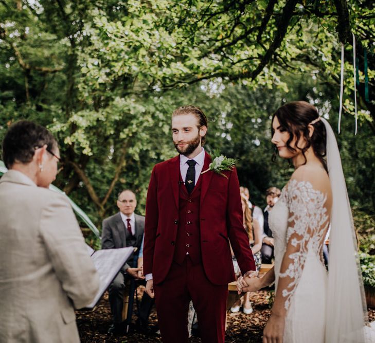 Outdoor Wedding Ceremony | Bride in Rosa Clara Naim Bridal Gown | Groom in Bespoke Burgundy Suit | Stylish Woodland Wedding in Cheshire | Clara Cooper Photography | Story Board Weddings Films