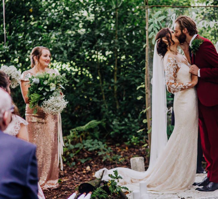 Outdoor Wedding Ceremony | Bride in Rosa Clara Naim Bridal Gown | Groom in Bespoke Burgundy Suit | Stylish Woodland Wedding in Cheshire | Clara Cooper Photography | Story Board Weddings Films