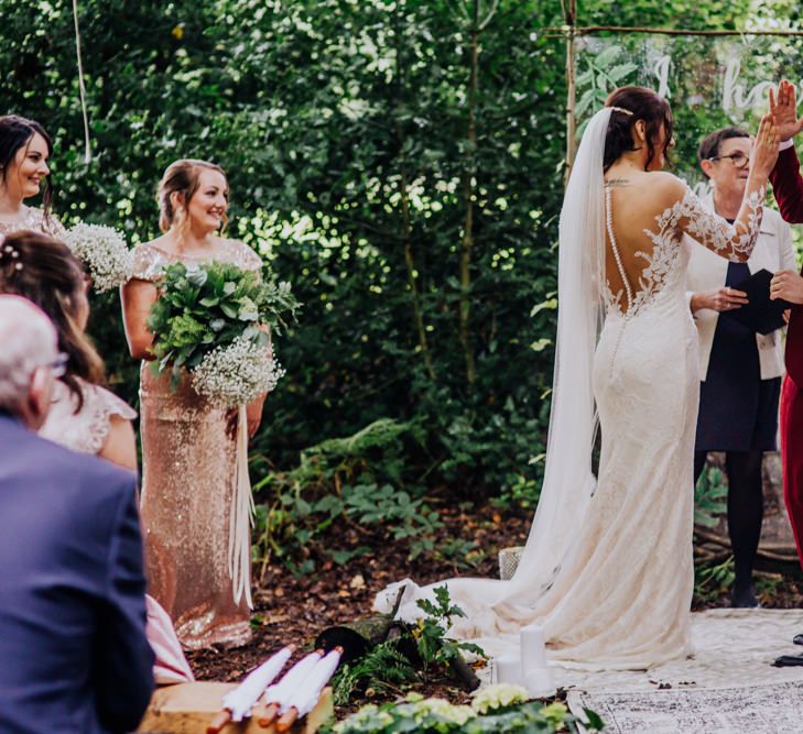 Outdoor Wedding Ceremony | Bride in Rosa Clara Naim Bridal Gown | Groom in Bespoke Burgundy Suit | Stylish Woodland Wedding in Cheshire | Clara Cooper Photography | Story Board Weddings Films