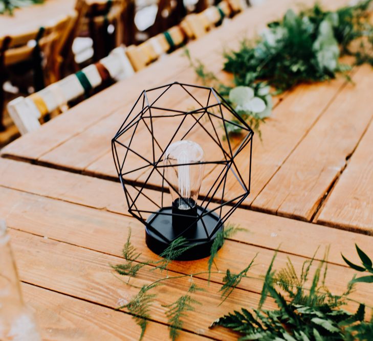 Geometric Light Table Decor | Stylish Woodland Wedding in Cheshire | Clara Cooper Photography | Story Board Weddings Films