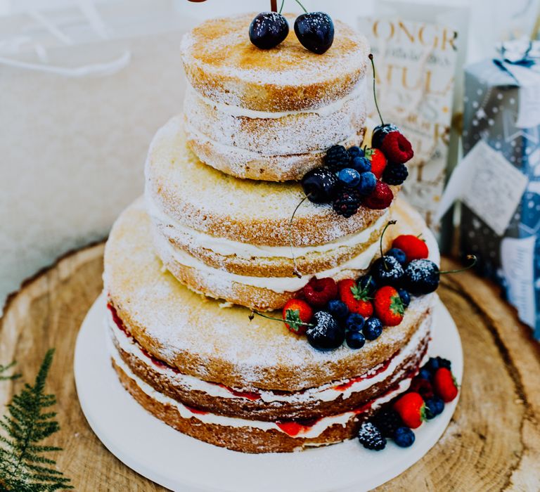 Naked Wedding Cake with Fruit Decor | Stylish Woodland Wedding in Cheshire | Clara Cooper Photography | Story Board Weddings Films