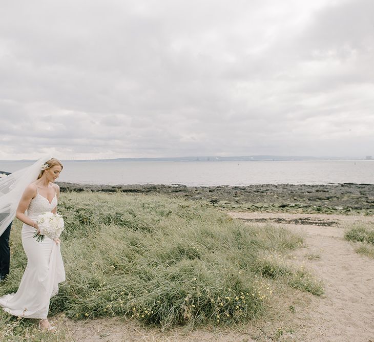 Bride in Enzoani Juri Bridal Gown | Groom in Black Tie | Elegant Black Tie Wedding with White Flowers at The Cleveland Tontine, North Yorkshire | Georgina Harrison Photography