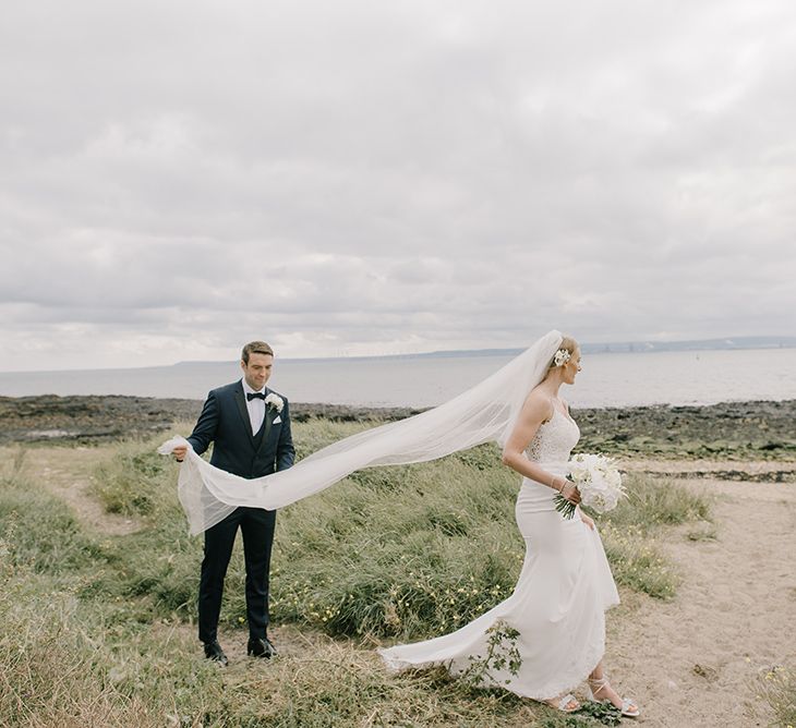 Bride in Enzoani Juri Bridal Gown | Groom in Black Tie | Elegant Black Tie Wedding with White Flowers at The Cleveland Tontine, North Yorkshire | Georgina Harrison Photography