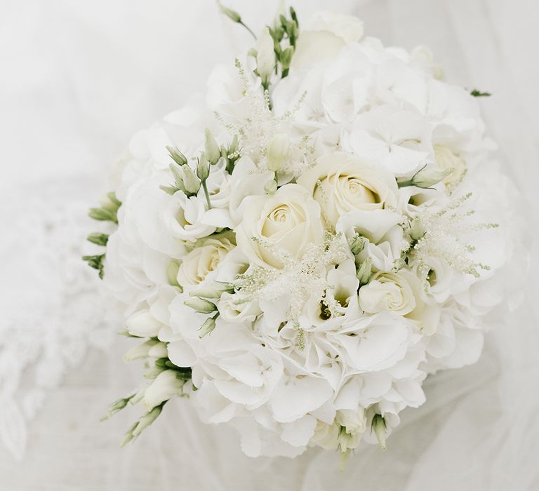 Pure White Hydrangea & Rose Bridal Bouquet | Elegant Black Tie Wedding with White Flowers at The Cleveland Tontine, North Yorkshire | Georgina Harrison Photography